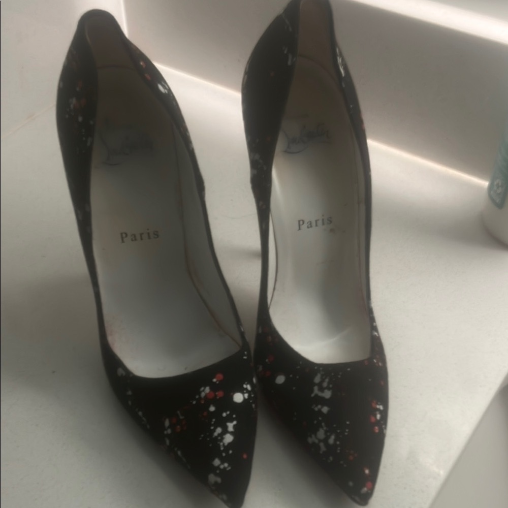 Christian Louboutin Black and White Heels with Sleek Silhouette